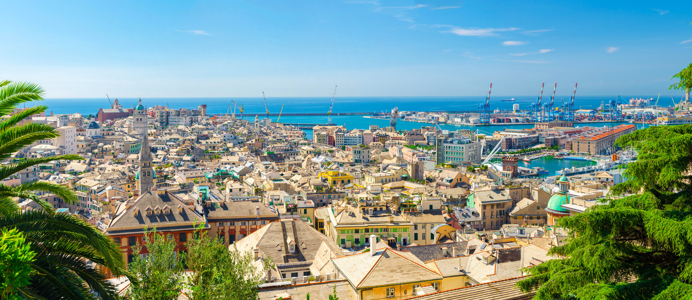 Top aerial scenic panoramic view from above of old historical centre quarter districts, panorama of european city Genoa (Genova), port and harbor of Ligurian and Mediterranean Sea, Liguria, Italy Aliaksandr Antanovich/Shutterstock