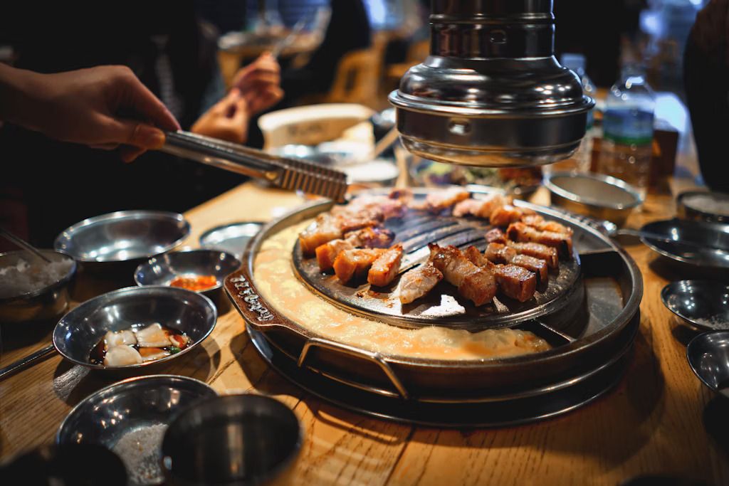 I ristoranti di barbecue, un piacere da condividere. © Patrick Foto / Getty Images