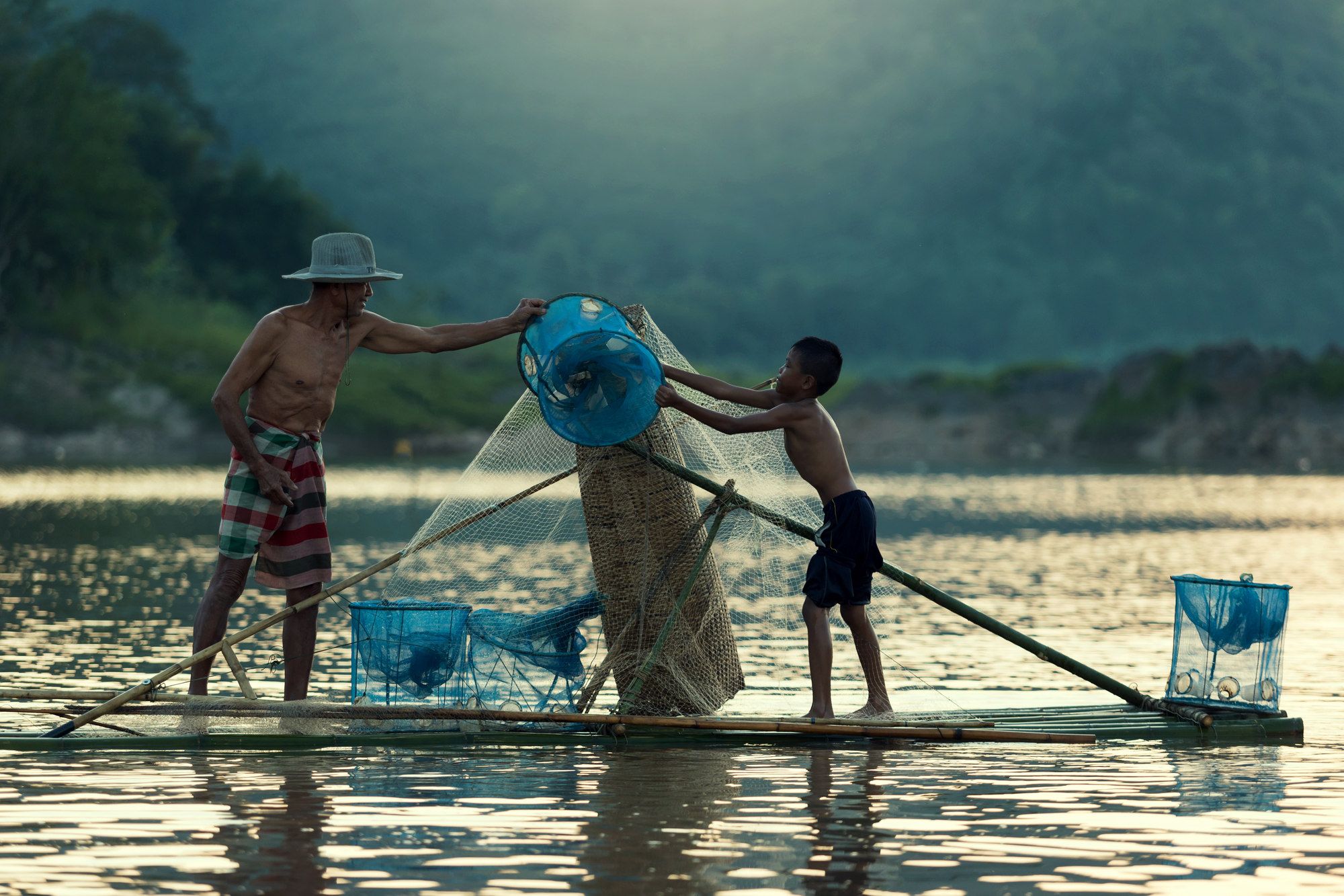 Pescatori sul fiume Mekong, vicino a Nong Khai, Thailandia ©sutipond/Shutterstock