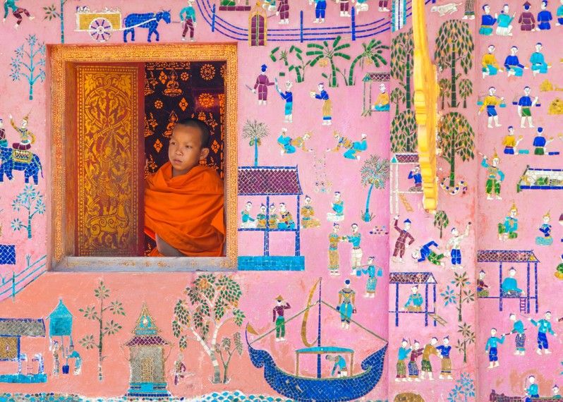 Un novizio al tempio Wat Xieng thong, Luang Pra bang, Laos. ©Art65395/Shutterstock