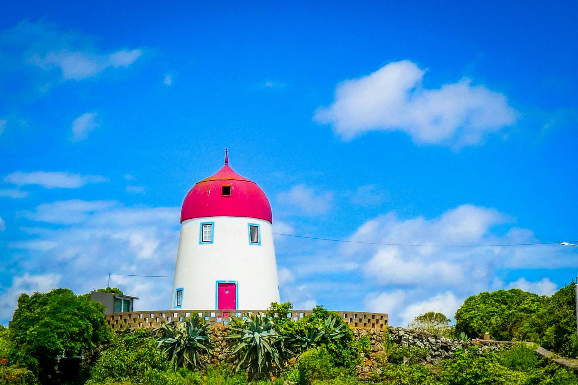 Molti mulini a vento di Graciosa sono oggi bellissime sistemazioni per turisti. © Peter Chesley / Getty Images